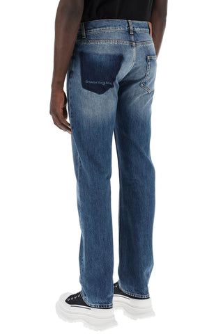 Straight Leg Jeans With Faux Pocket On The Back.