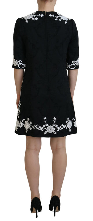 Elegant Black A-line Mini Dress With Lace Trim